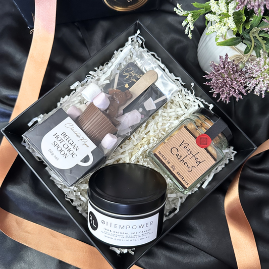 Mum’s Cozy Moments Gift Box with candle, hot chocolate and cashews.