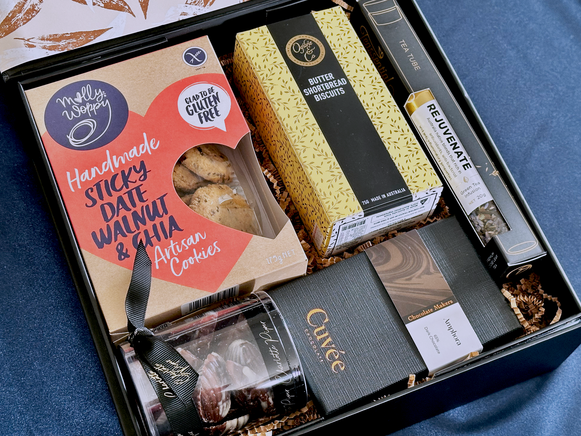 The Artisan Treat Box with premium chocolates, cookies, and tea